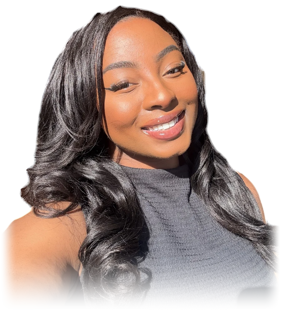 Portrait of the artist behind Zentrified Art, smiling, with long, wavy black hair.